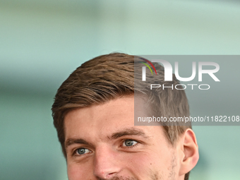 Netherlands Formula One driver Max Verstappen of Red Bull Racing walks through the paddock as he arrives ahead of the Formula 1 Grand Prix o...