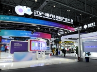 Visitors experience the 2024 Quantum Technology and Industry Conference in Hefei, China, on November 30, 2024. (