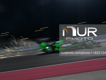 Chinese driver Zhou Guanyu of Alfa Romeo Ferrari participates in the first practice session of the Formula 1 Grand Prix of Qatar at Lusail I...