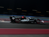 Danish driver Kevin Magnussen of Haas Ferrari participates in the first practice session of the Formula 1 Grand Prix of Qatar at Lusail Inte...