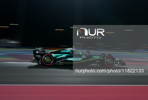 Spanish driver Fernando Alonso of Aston Martin Aramco Mercedes participates in the first practice session of the Formula 1 Grand Prix of Qat...