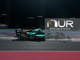 Spanish driver Fernando Alonso of Aston Martin Aramco Mercedes participates in the first practice session of the Formula 1 Grand Prix of Qat...