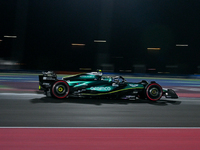 Spanish driver Fernando Alonso of Aston Martin Aramco Mercedes participates in the first practice session of the Formula 1 Grand Prix of Qat...