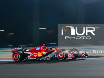 Monaco's driver Charles Leclerc of Ferrari participates in the first practice session of the Formula 1 Grand Prix of Qatar at Lusail Interna...