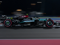 British driver Lewis Hamilton of Mercedes participates in the first practice session of the Formula 1 Grand Prix of Qatar at Lusail Internat...