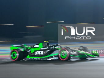 Chinese driver Zhou Guanyu of Alfa Romeo Ferrari participates in the first practice session of the Formula 1 Grand Prix of Qatar at Lusail I...