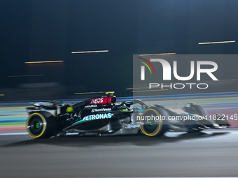 British driver Lewis Hamilton of Mercedes participates in the first practice session of the Formula 1 Grand Prix of Qatar at Lusail Internat...