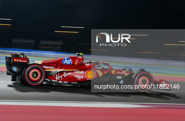 Spanish driver Carlos Sainz of Ferrari participates in the first practice session of the Formula 1 Grand Prix of Qatar at Lusail Internation...