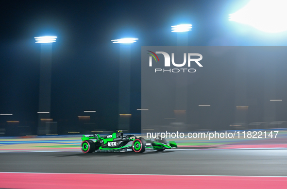 Chinese driver Zhou Guanyu of Alfa Romeo Ferrari participates in the first practice session of the Formula 1 Grand Prix of Qatar at Lusail I...