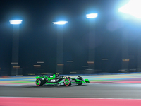 Chinese driver Zhou Guanyu of Alfa Romeo Ferrari participates in the first practice session of the Formula 1 Grand Prix of Qatar at Lusail I...