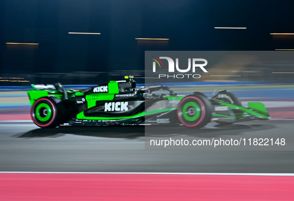 Chinese driver Zhou Guanyu of Alfa Romeo Ferrari participates in the first practice session of the Formula 1 Grand Prix of Qatar at Lusail I...