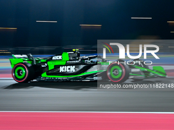 Chinese driver Zhou Guanyu of Alfa Romeo Ferrari participates in the first practice session of the Formula 1 Grand Prix of Qatar at Lusail I...