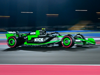 Chinese driver Zhou Guanyu of Alfa Romeo Ferrari participates in the first practice session of the Formula 1 Grand Prix of Qatar at Lusail I...