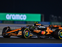 The British Formula One driver Lando Norris of McLaren participates in the Sprint qualifying session of the Formula 1 Grand Prix of Qatar at...