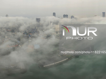 The city of Colombo is seen amid smog and rain from Lotus Tower in Colombo, Sri Lanka, on November 30, 2024. Sri Lanka's Central Environment...