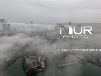 The city of Colombo is seen amid smog and rain from Lotus Tower in Colombo, Sri Lanka, on November 30, 2024. Sri Lanka's Central Environment...