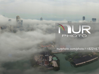 The city of Colombo is seen amid smog and rain from Lotus Tower in Colombo, Sri Lanka, on November 30, 2024. Sri Lanka's Central Environment...