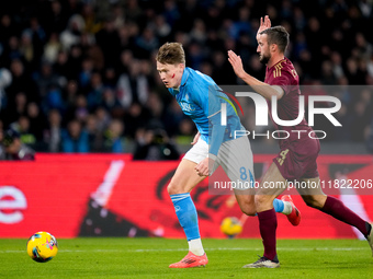 Scott McTominay of SSC Napoli and Bryan Cristante of AS Roma compete for the ball during the serie Serie A Enilive match between SSC Napoli...