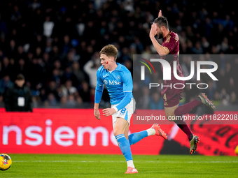 Scott McTominay of SSC Napoli and Bryan Cristante of AS Roma compete for the ball during the serie Serie A Enilive match between SSC Napoli...