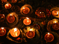 Nepali Hindu devotees light oil-fed lamps on the embankment of the Bagmati River in Kathmandu, Nepal, on November 30, 2024, on the occasion...