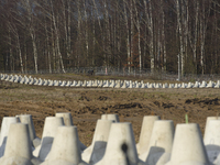 Anti-tank concrete fortifications are pictured at the Polish-Russian border in Dabrowka, Poland, on November 30, 2024. The East Shield progr...