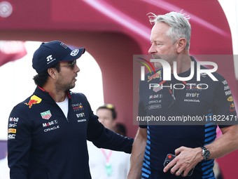 Sergio Perez of Red Bull Racing and Jonathan Weathley before Sprint ahead of the Formula 1 Grand Prix of Qatar at Lusail International Circu...