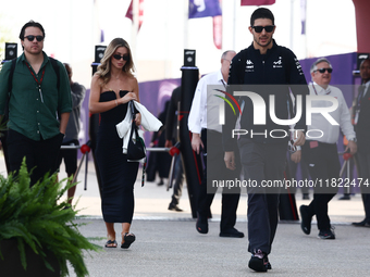 Flavy Barla and Esteban Ocon of Alpine before Sprint ahead of the Formula 1 Grand Prix of Qatar at Lusail International Circuit in Lusail, Q...