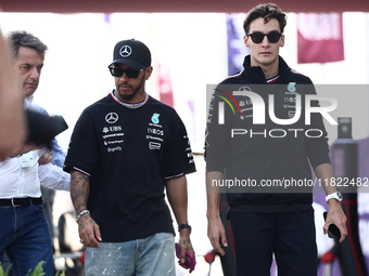 Lewis Hamilton and George Russell of Mercedes before Sprint ahead of the Formula 1 Grand Prix of Qatar at Lusail International Circuit in Lu...