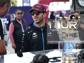 Pierre Gasly of Alpine and Premier League Trophy before Sprint ahead of the Formula 1 Grand Prix of Qatar at Lusail International Circuit in...