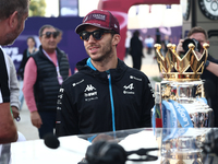 Pierre Gasly of Alpine and Premier League Trophy before Sprint ahead of the Formula 1 Grand Prix of Qatar at Lusail International Circuit in...