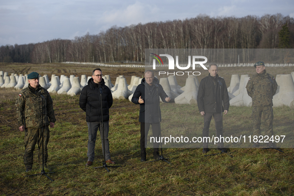 From left to right: Gen. Marek Wawrzyniak, Minister of Infrastructure Dariusz Klimczak, Prime Minister Donald Tusk, Deputy Minister of Natio...