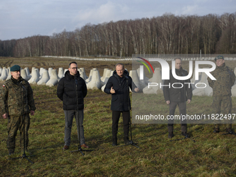 From left to right: Gen. Marek Wawrzyniak, Minister of Infrastructure Dariusz Klimczak, Prime Minister Donald Tusk, Deputy Minister of Natio...