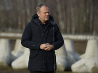 Polish Prime Minister Donald Tusk speaks to the media at the Polish-Russian border in Dabrowka, Poland, on November 30, 2024. The East Shiel...