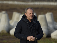 Polish Prime Minister Donald Tusk speaks to the media at the Polish-Russian border in Dabrowka, Poland, on November 30, 2024. The East Shiel...