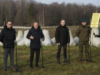 From left to right: Minister of Infrastructure Dariusz Klimczak, Prime Minister Donald Tusk, Deputy Minister of National Defense Cezary Tomc...