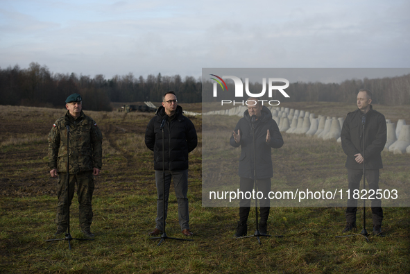 From left to right: Gen. Marek Wawrzyniak, Minister of Infrastructure Dariusz Klimczak, Prime Minister Donald Tusk, and Deputy Minister of N...