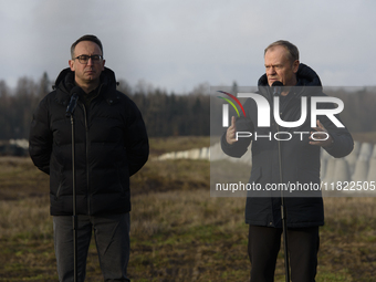 From left to right: Minister of Infrastructure Dariusz Klimczak and Prime Minister Donald Tusk participate in a press conference at the Poli...