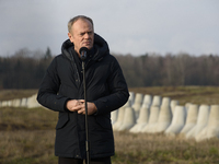 Polish Prime Minister Donald Tusk speaks to the media at the Polish-Russian border in Dabrowka, Poland, on November 30, 2024. The East Shiel...