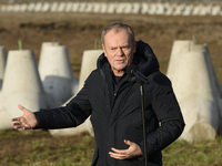 Polish Prime Minister Donald Tusk speaks to the media at the Polish-Russian border in Dabrowka, Poland, on November 30, 2024. The East Shiel...