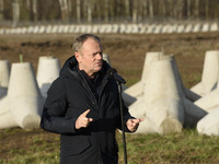 Polish Prime Minister Donald Tusk speaks to the media at the Polish-Russian border in Dabrowka, Poland, on November 30, 2024. The East Shiel...