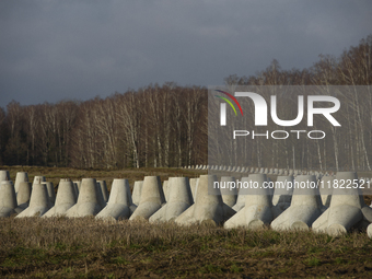 Anti-tank concrete fortifications are pictured at the Polish-Russian border in Dabrowka, Poland, on November 30, 2024. The East Shield progr...