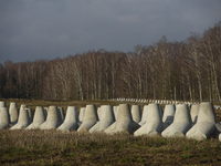 Anti-tank concrete fortifications are pictured at the Polish-Russian border in Dabrowka, Poland, on November 30, 2024. The East Shield progr...