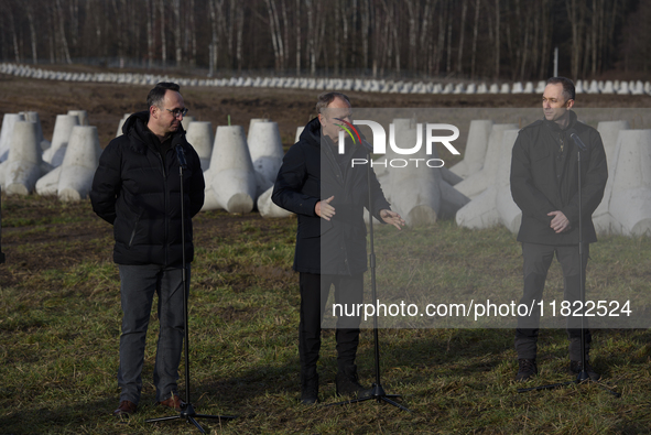 From left to right: Minister of Infrastructure Dariusz Klimczak, Prime Minister Donald Tusk, and Deputy Minister of National Defense Cezary...