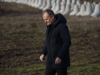 Polish Prime Minister Donald Tusk leaves a press conference held at the Polish-Russian border in Dabrowka, Poland, on November 30, 2024. The...