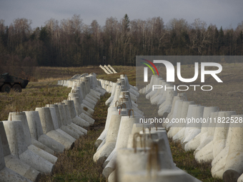 Anti-tank concrete fortifications are pictured at the Polish-Russian border in Dabrowka, Poland, on November 30, 2024. The East Shield progr...