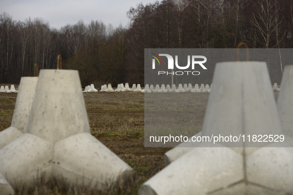 Anti-tank concrete fortifications are pictured at the Polish-Russian border in Dabrowka, Poland, on November 30, 2024. The East Shield progr...