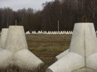 Anti-tank concrete fortifications are pictured at the Polish-Russian border in Dabrowka, Poland, on November 30, 2024. The East Shield progr...