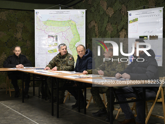 From left to right: Deputy Minister of National Defense Cezary Tomczyk, Gen. Marek Wawrzyniak, Prime Minister Donald Tusk, and Minister of I...