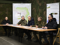 From left to right: Deputy Minister of National Defense Cezary Tomczyk, Gen. Marek Wawrzyniak, Prime Minister Donald Tusk, and Minister of I...