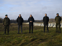 From left to right: Gen. Marek Wawrzyniak, Minister of Infrastructure Dariusz Klimczak, Prime Minister Donald Tusk, Deputy Minister of Natio...